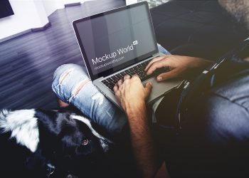 Man Working on a MacBook Pro Mockup