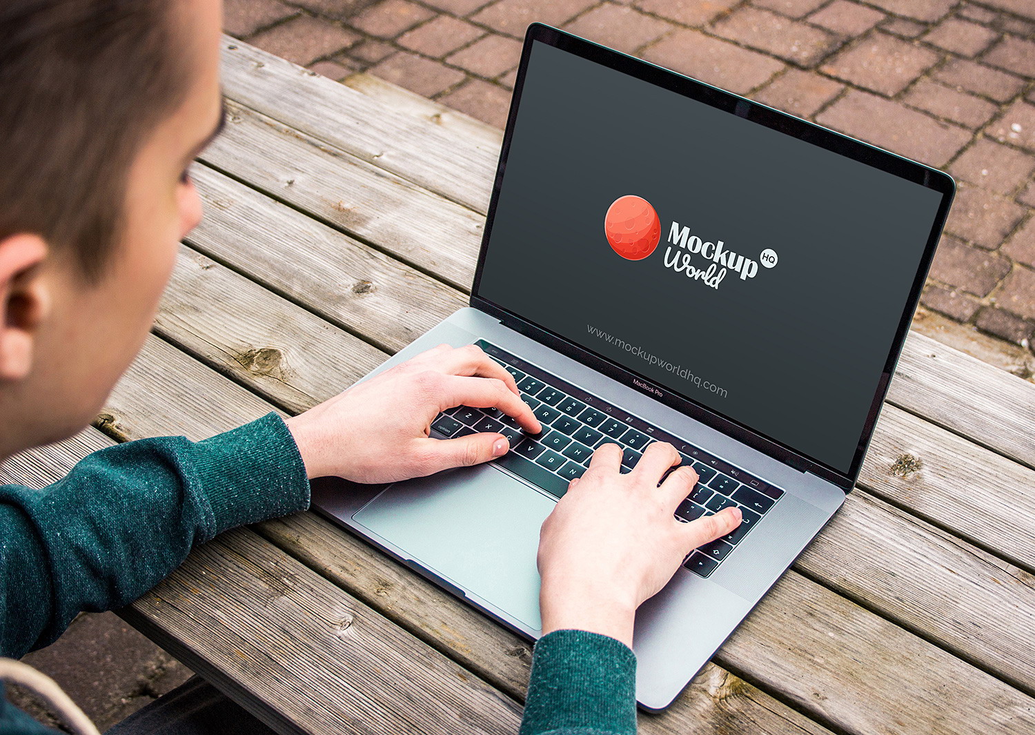 Download Man Typing on MacBook Pro Mockup Free | Mockup World HQ