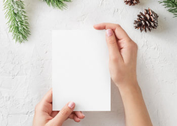 Free Christmas Card Mockup in Hands