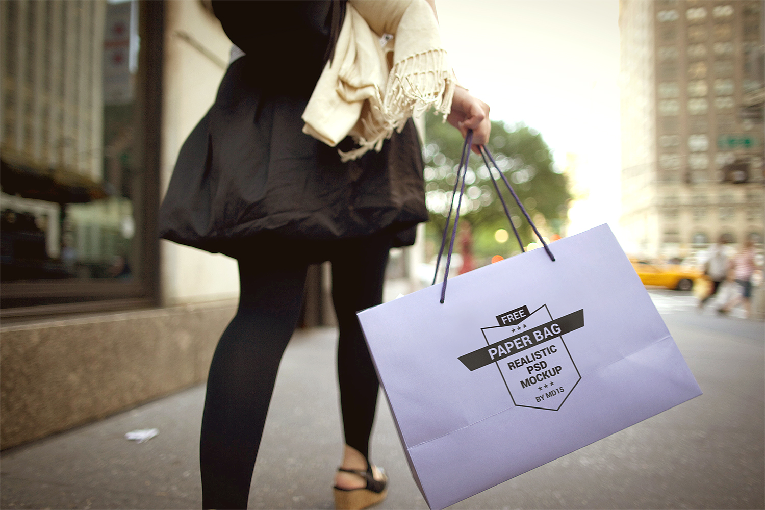 Download Girl Holding Paper Shopping Bag Mockup | Mockup World HQ