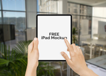 Free iPad Pro 2018 in Hand Mock-Up