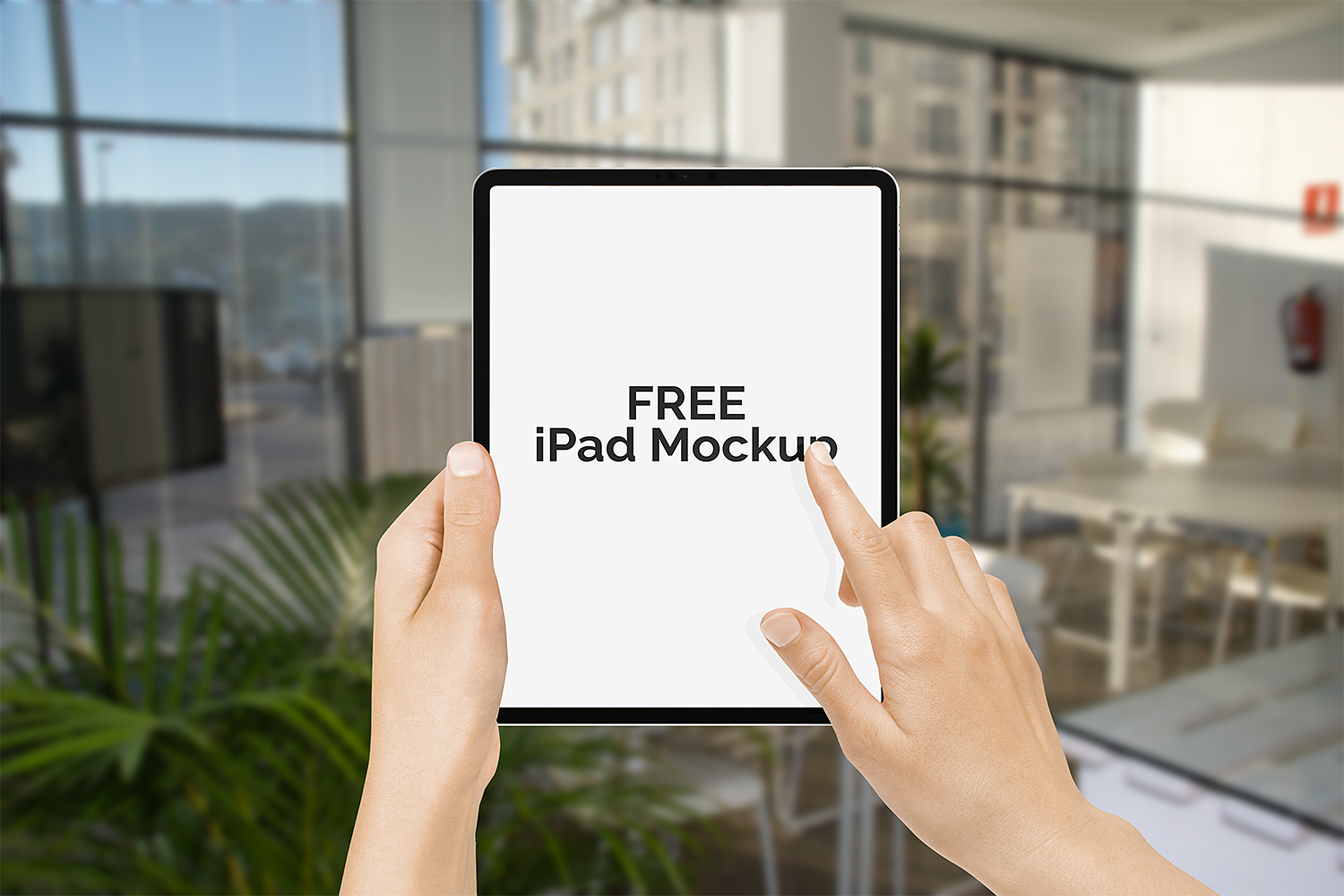 Free iPad Pro 2018 in Hand Mock-Up