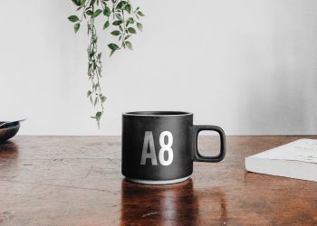 Free Mug on a Table Mockup