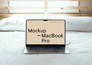 MacBook Pro on Bed Free Mockup
